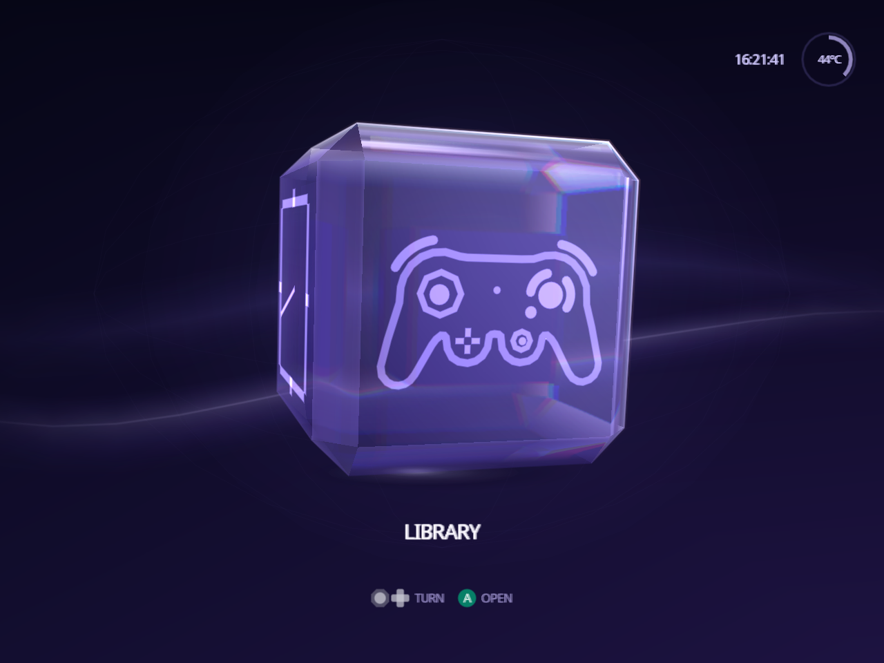 The Indigo Home screen on a GameCube: a glass cube on its Library face, a GameCube controller glowing on the glass and LIBRARY named underneath.